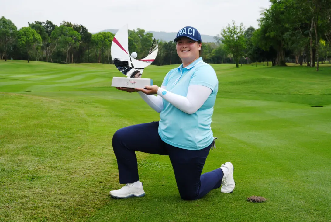 Angel Yin holds the Honda LPGA Thailand trophy after winning the 2025 title at Siam Country Club in Pattaya, Thailand