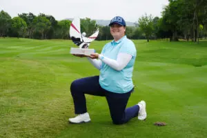 Angel Yin holds the Honda LPGA Thailand trophy after winning the 2025 title at Siam Country Club in Pattaya, Thailand