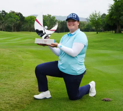Angel Yin holds the Honda LPGA Thailand trophy after winning the 2025 title at Siam Country Club in Pattaya, Thailand