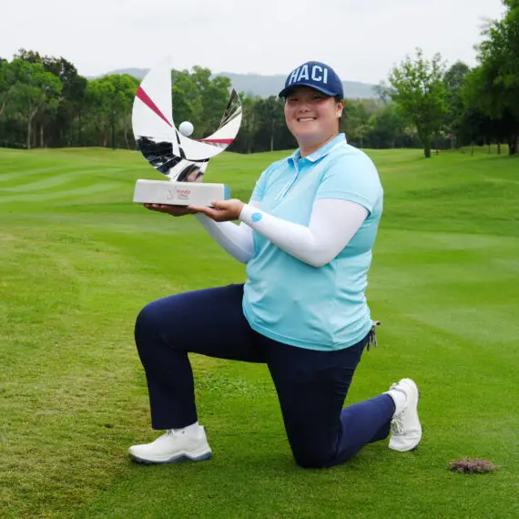Angel Yin holds the Honda LPGA Thailand trophy after winning the 2025 title at Siam Country Club in Pattaya, Thailand